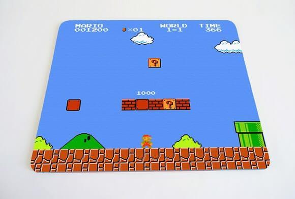 Mouse Pads geeks inspirados nos jogos do Pac-Man e Super Mario.