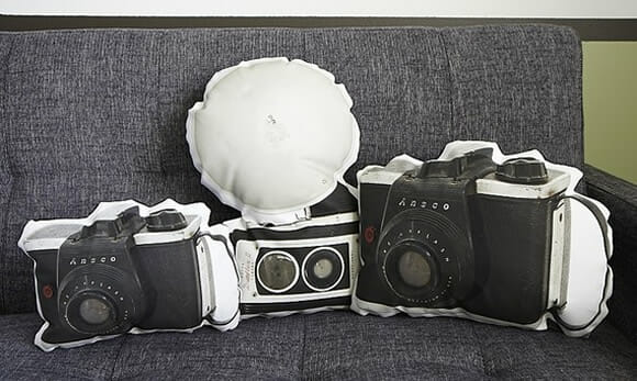Almofada em forma de câmera fotográfica para apaixonados por fotografia.