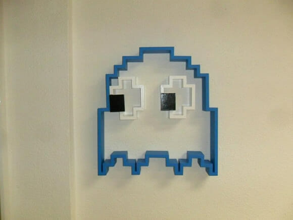 Estante de livros do fantasma do Pac-Man