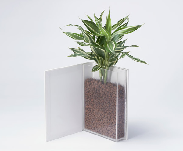 Vaso de plantas em forma de livro para ficar camuflado entre os livros da estante