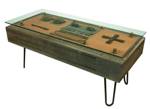 Decoração geek com a mesa de centro em forma do controle do Nintendinho 8-bits estilo steampunk